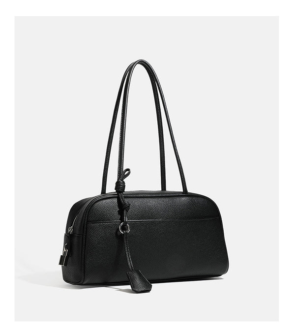 Structured rounded rectangular shoulder bag with pebbled leather-look finish, dual long handles, top zipper, front zip