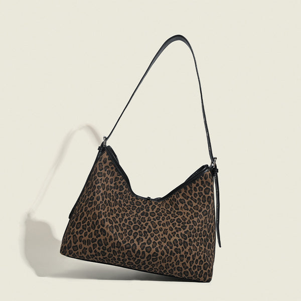 Lässige Hobo-Tasche mit braun-schwarzem Leopardenmuster, Kordelzug mit Schleife, schwarzem Besatz in Lederoptik und Niete in Silberoptik