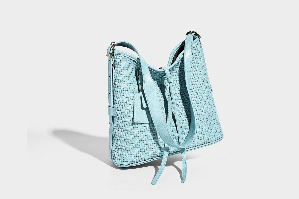 Slouchy woven-texture bucket shoulder bag with tassel tie closure and gold-tone hardware, detail view 30