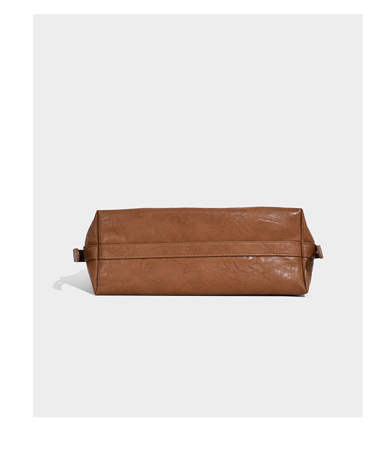 Slouchy leather-look hobo shoulder bag with gold-tone hardware and adjustable strap in brown, detail view 11