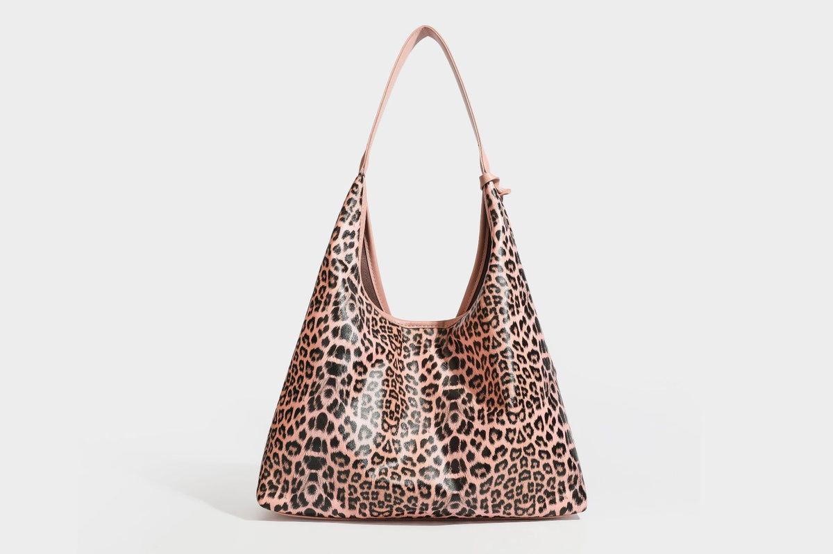 Glossy leopard-print slouchy shoulder bag with long strap and detachable tan zip pouch, detail view 36
