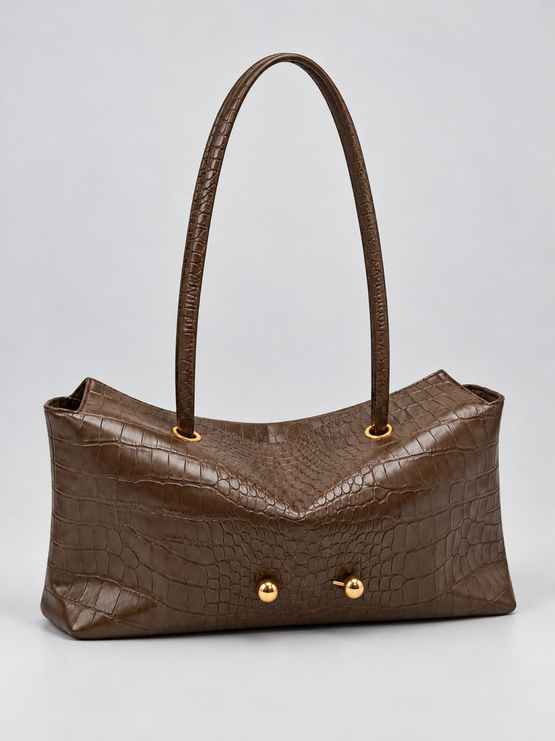 Wide embossed-texture shoulder tote bag with single loop handle and gold-tone toggle hardware, detail view 32