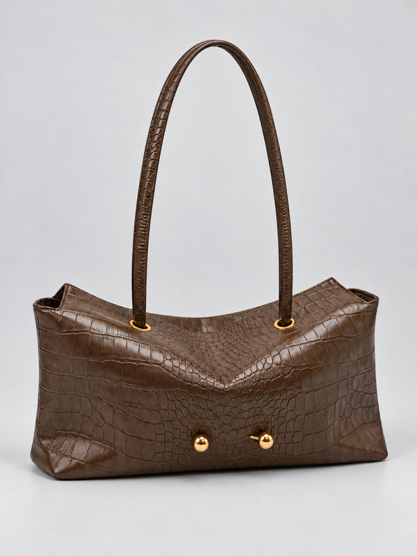 Wide embossed-texture shoulder tote bag with single loop handle and gold-tone toggle hardware, detail view 32