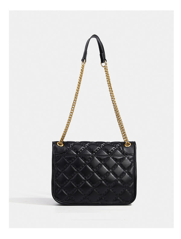Compact diamond-quilted flap shoulder bag with gold-tone chain strap and floral turn-lock clasp, detail view 15