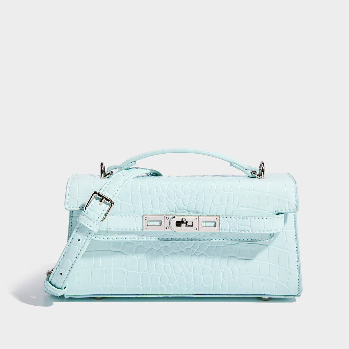 Compact structured flap satchel with glossy crocodile-embossed leather-look finish, silver-tone turn-lock hardware, and