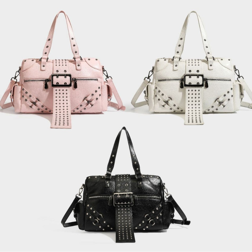Glossy crinkled barrel handbag with silver stud buckle strap and detachable shoulder strap, detail view 43