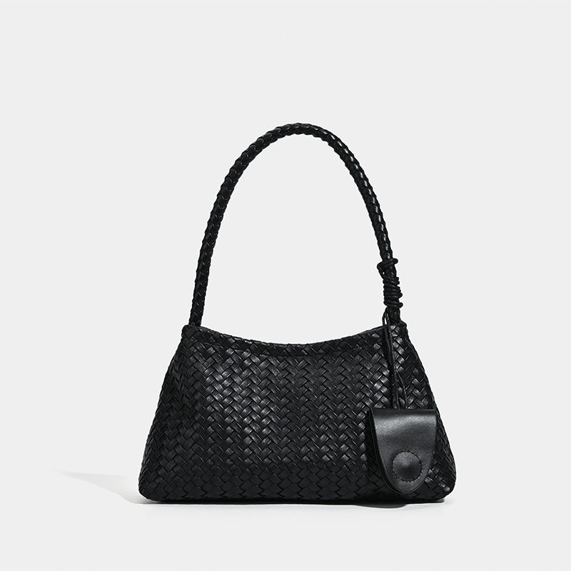 Woven leather-look shoulder bag with braided strap, trapezoidal body, and matching zip pouch, detail view 7