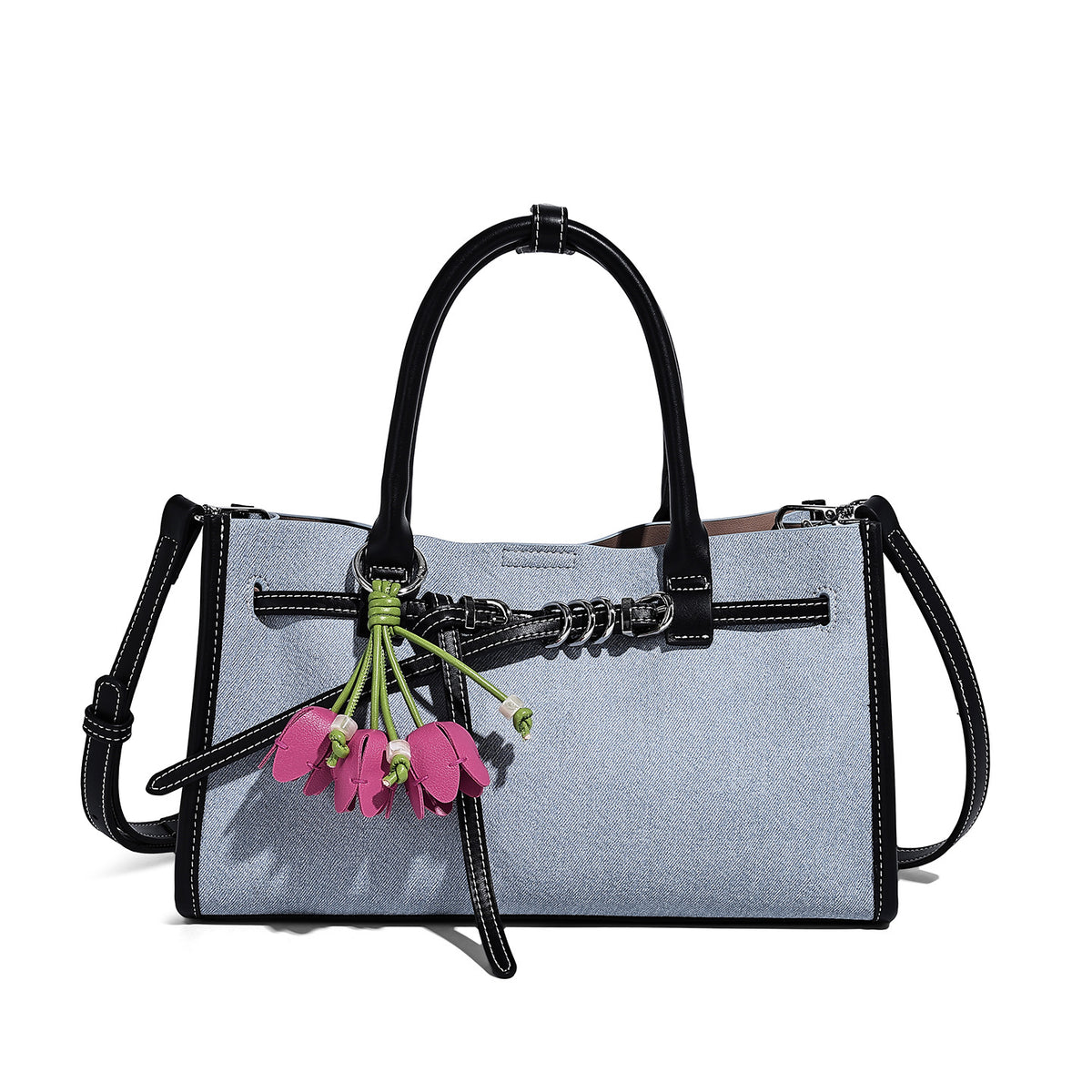 Structured rectangular tote satchel in denim-look fabric with dark trim, knotted front strap hardware, and detachable, detail