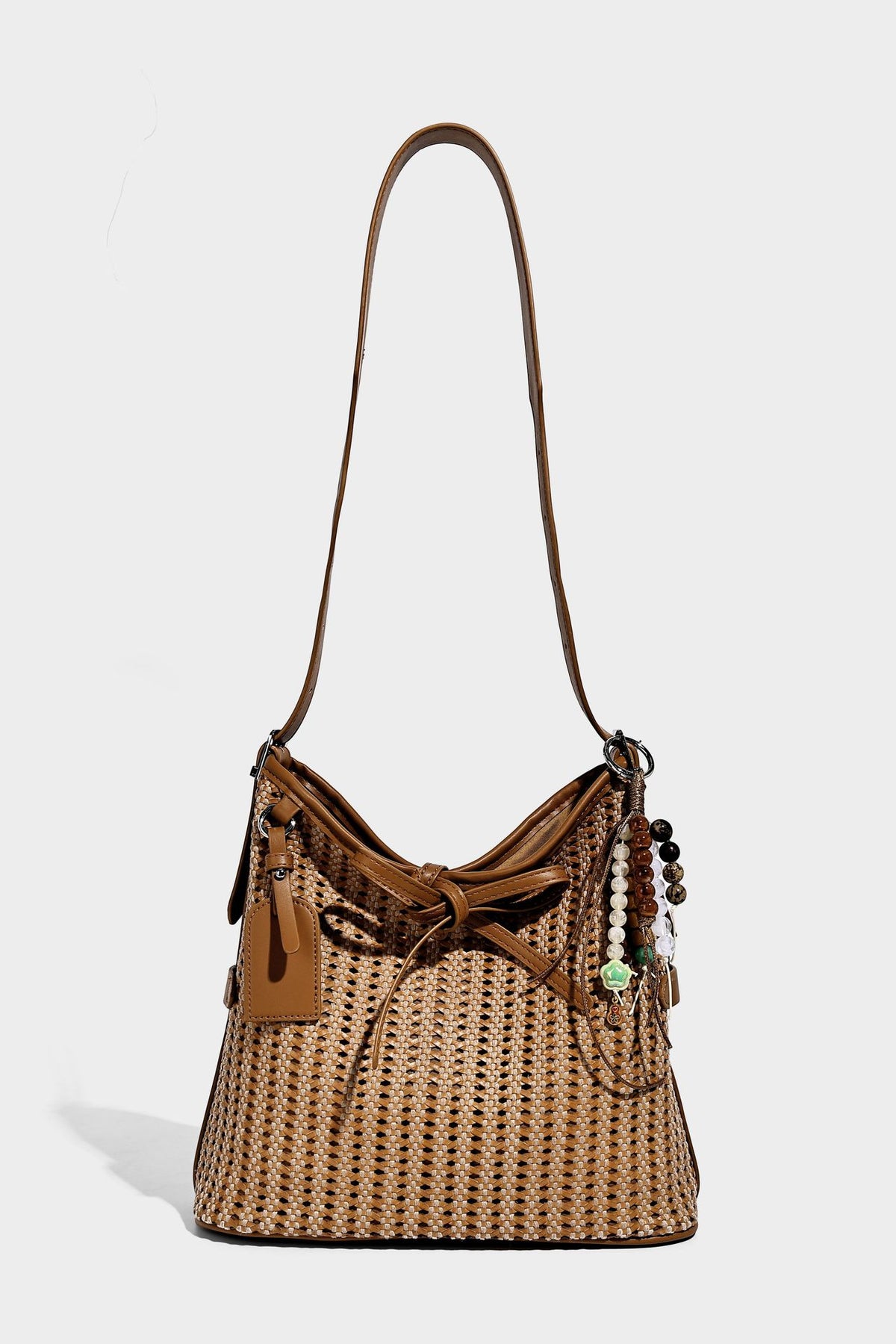 Slouchy open-weave shoulder tote bag with leather-look tan trim, tie-front closure, and long adjustable strap, detail view 23
