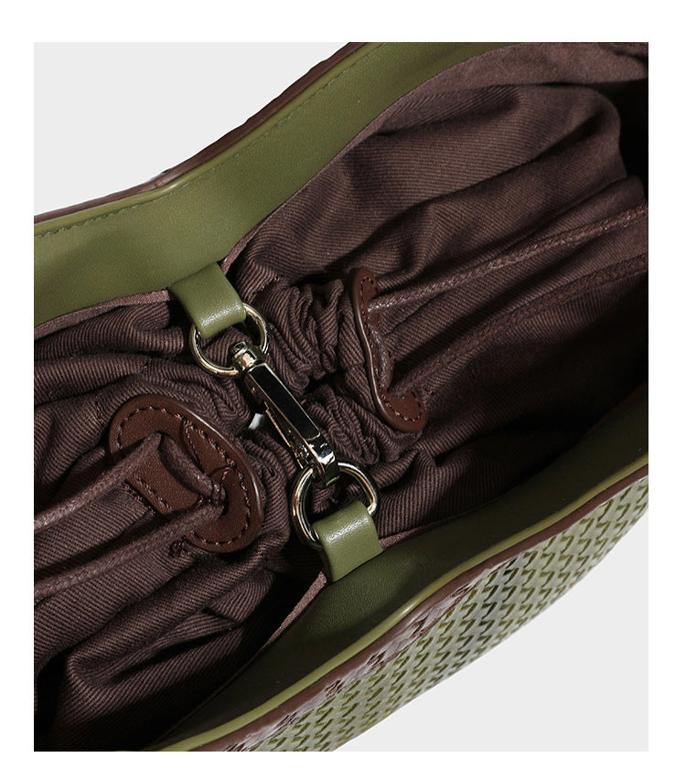 Woven tote bag with braided shoulder straps, drawstring closure, and dangling metal-and-bead charm, detail view 29