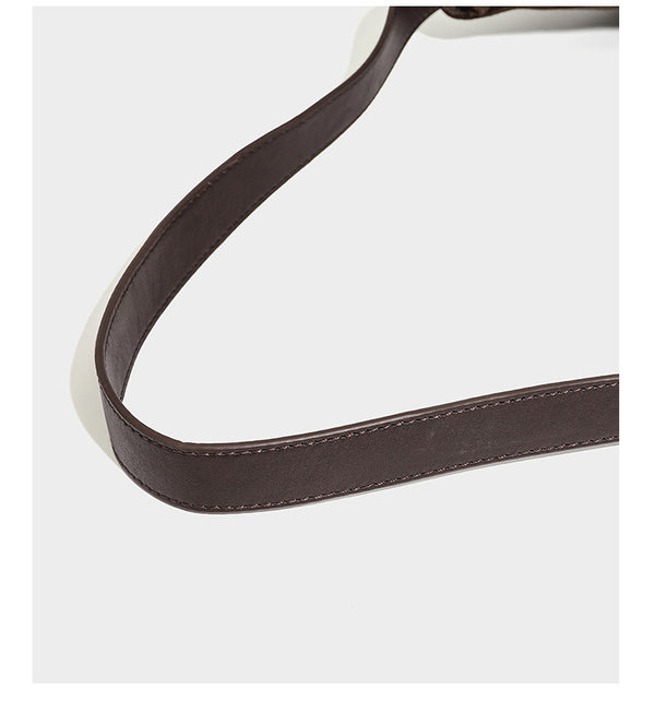 Slouchy hobo shoulder bag in matte croc-embossed leather-look finish with top zip closure and long adjustable strap, detail