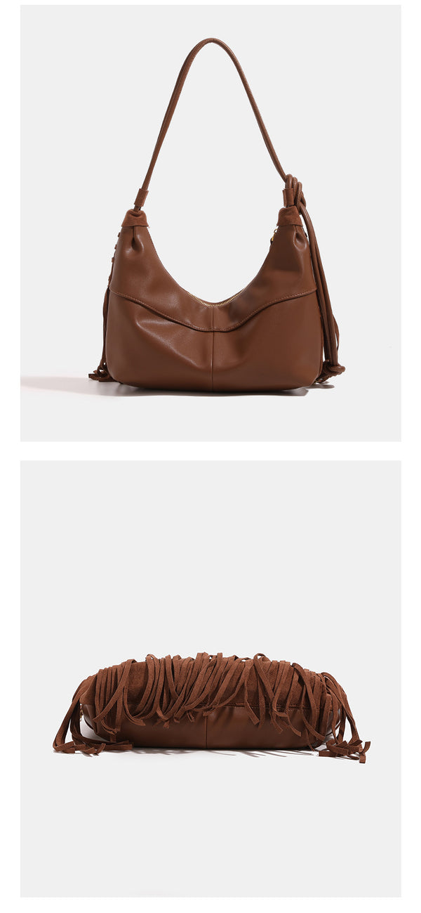 Slouchy fringe hobo shoulder bag in matte suede-like finish with tie-knot cord strap and gold-tone zip closure, detail view