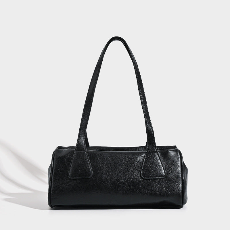 Glossy leather-look barrel shoulder bag with zip closure and top handles, detail view 8