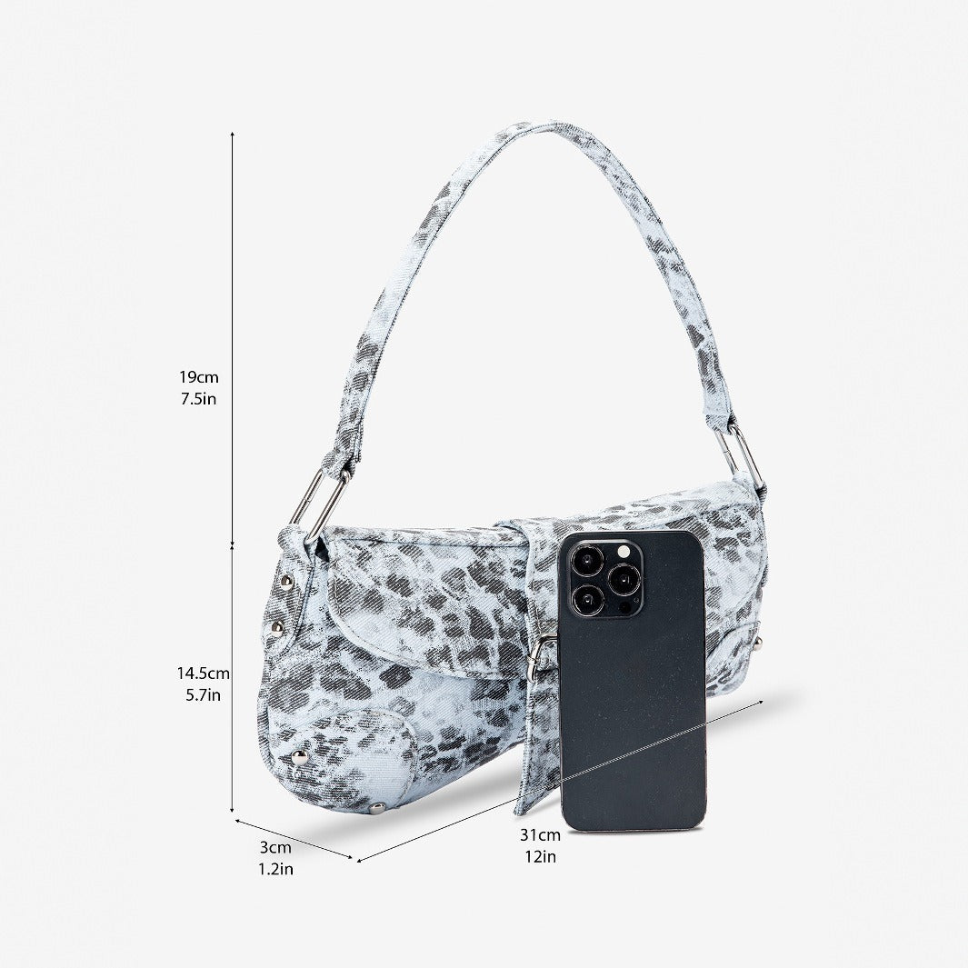 Small washed leopard print shoulder bag in blue-grey with silver buckle strap and stud accents, detail view 2