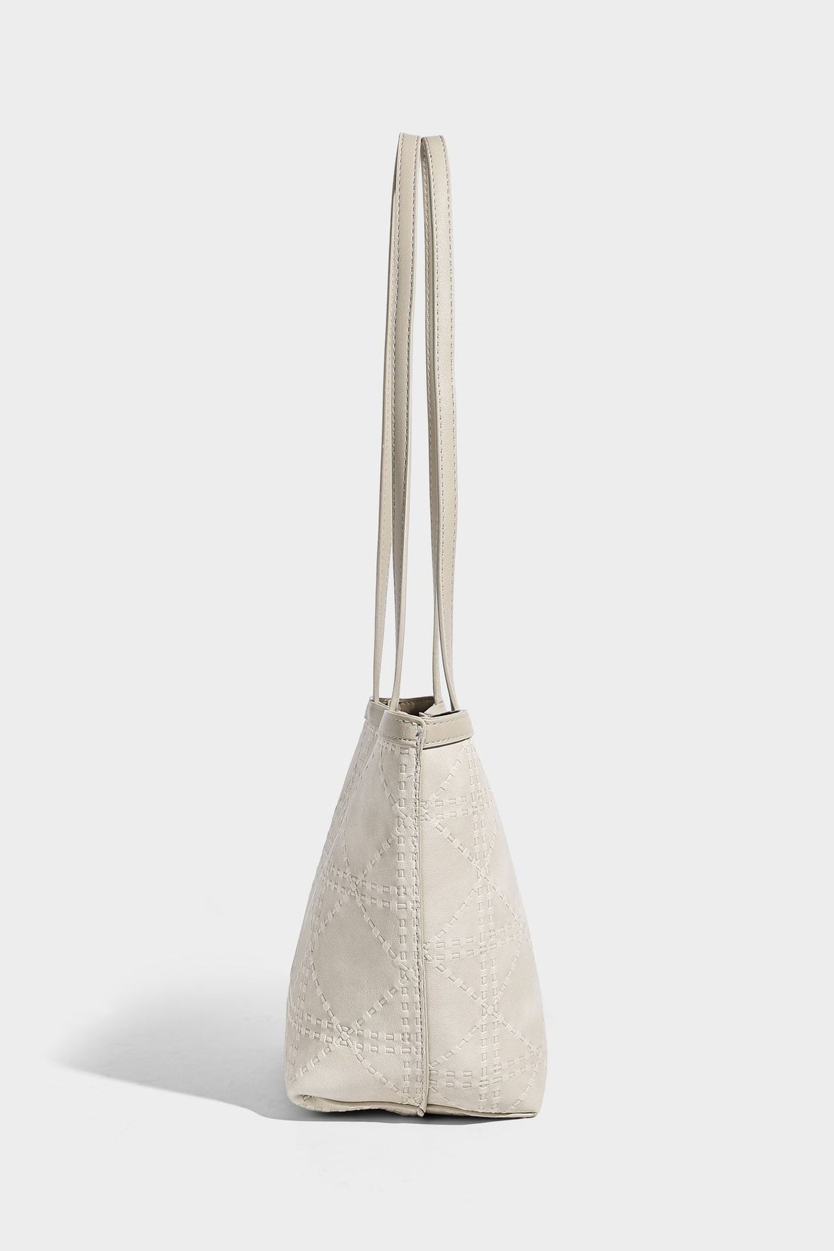 Quilted diamond-pattern tote bag with attached front zip pouch and long shoulder straps, detail view 22