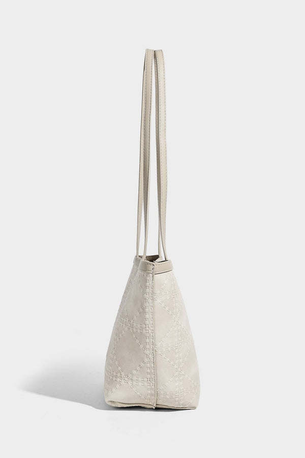 Quilted diamond-pattern tote bag with attached front zip pouch and long shoulder straps, detail view 22