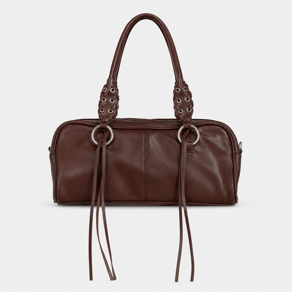 Rectangular suede-look barrel bag with laced eyelet handles, silver O-ring hardware, and hanging leather-look fringe tie