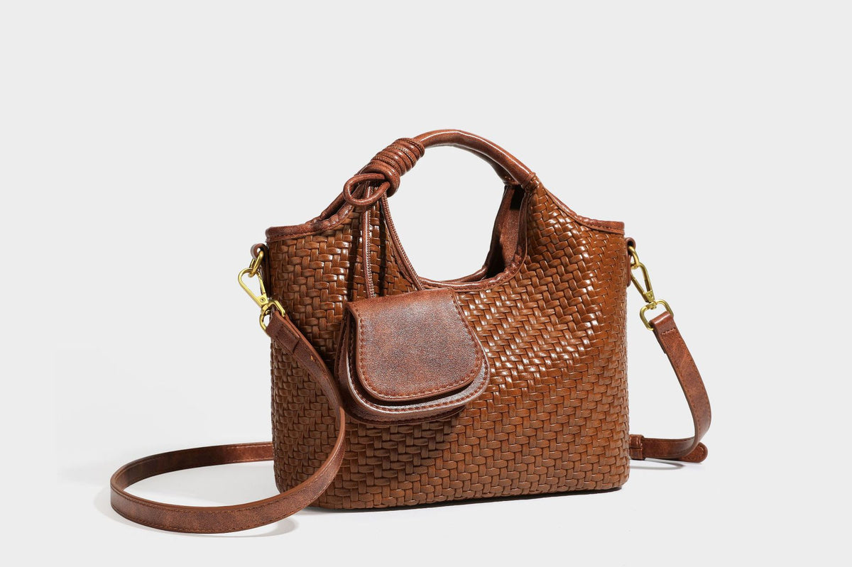 Woven leather-look tote bag in mocha brown with knotted top handle, front flap pocket, and detachable crossbody strap with