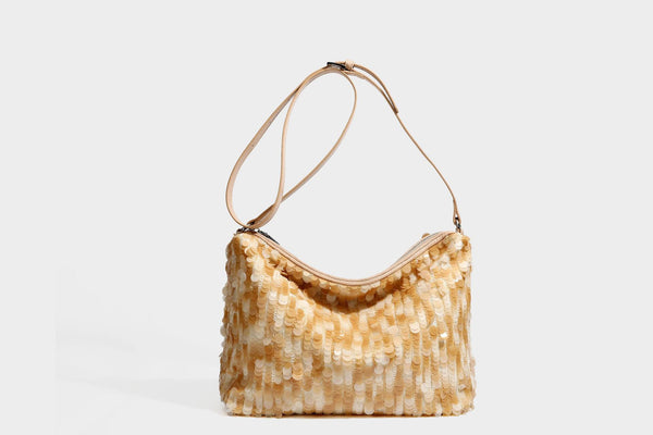 Slouchy paillette sequin hobo shoulder bag with zip closure and adjustable leather-look strap with silver chain hardware