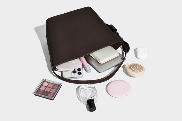 Pebbled leather-look bucket shoulder bag with zip inner pouch and adjustable crossbody strap, detail view 22