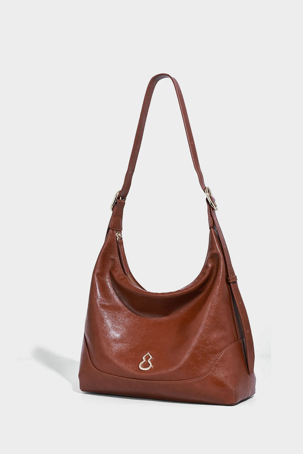 Glossy leather-look slouchy hobo shoulder bag with zip closure, gold-tone hardware, and adjustable strap, detail view 13