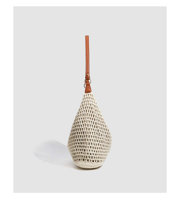 Cream open-weave crochet hobo shoulder bag with tan leather-look strap and gold-tone ring hardware, detail view 7