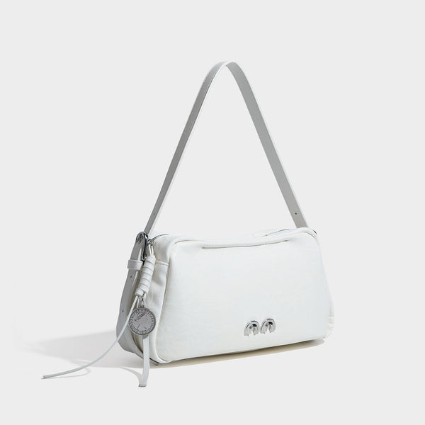 Compact black crinkled leather-look baguette shoulder bag with gold-tone arch hardware and adjustable strap, detail view 3