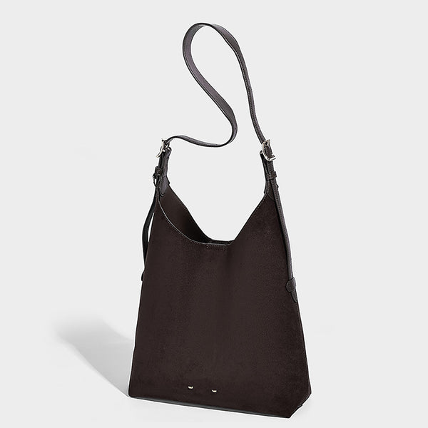 Large open-top hobo shoulder bag in tan leather-look finish with detachable zip pouch and adjustable buckle strap, detail