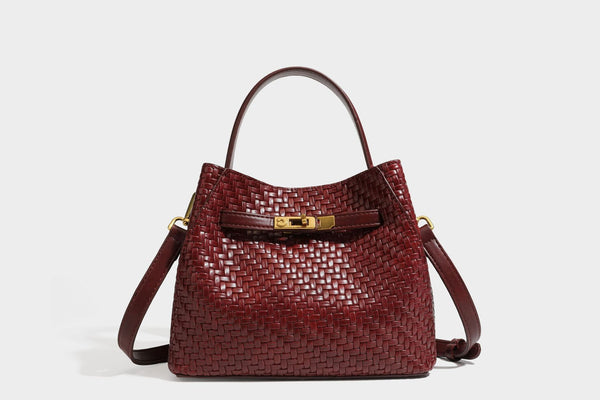 Structured woven leather-look bucket bag with gold-tone turn-lock hardware and detachable shoulder strap, detail view 47