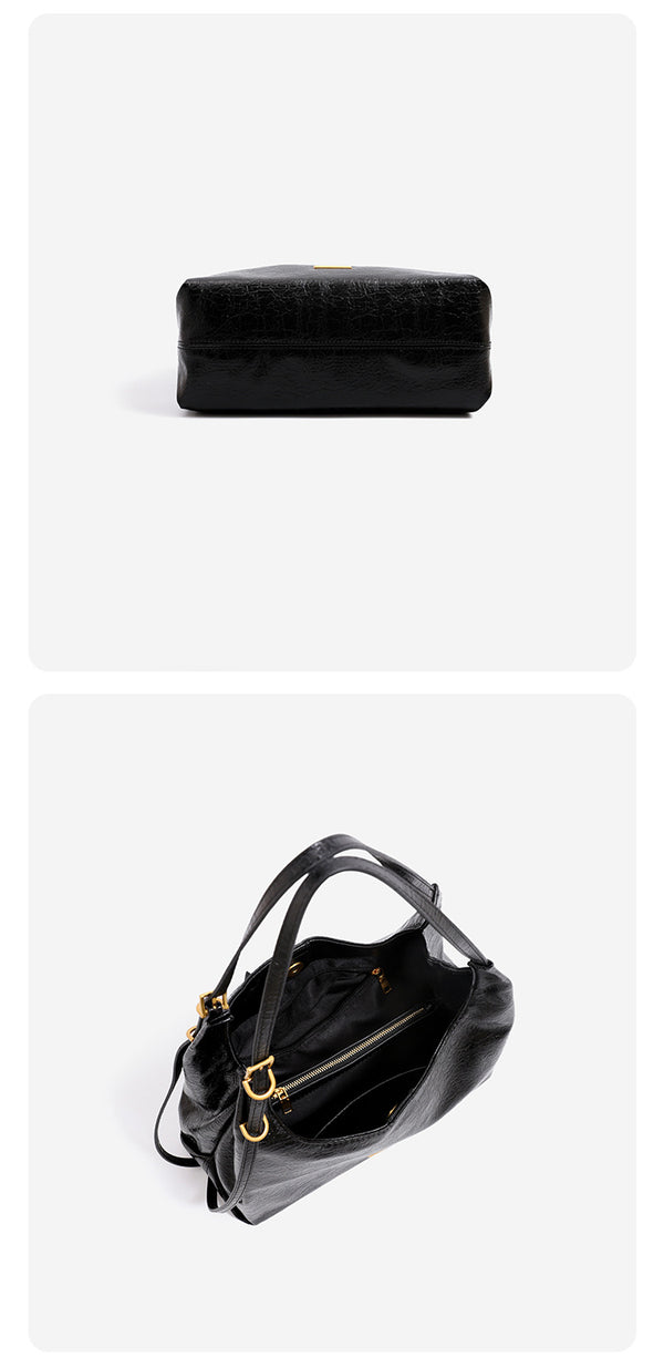 Slouchy hobo shoulder bag in crinkle high-gloss leather-look finish with gold-tone bar hardware and adjustable strap, detail