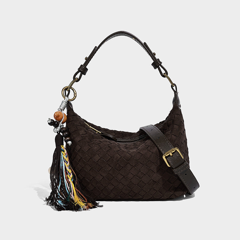 Small woven-texture crescent hobo bag in dark chocolate brown with top zip closure, gold-tone hardware, and adjustable