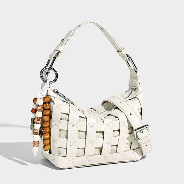 Small woven convertible shoulder bag with top zipper, silver-tone hardware, and detachable crossbody strap, detail view 11