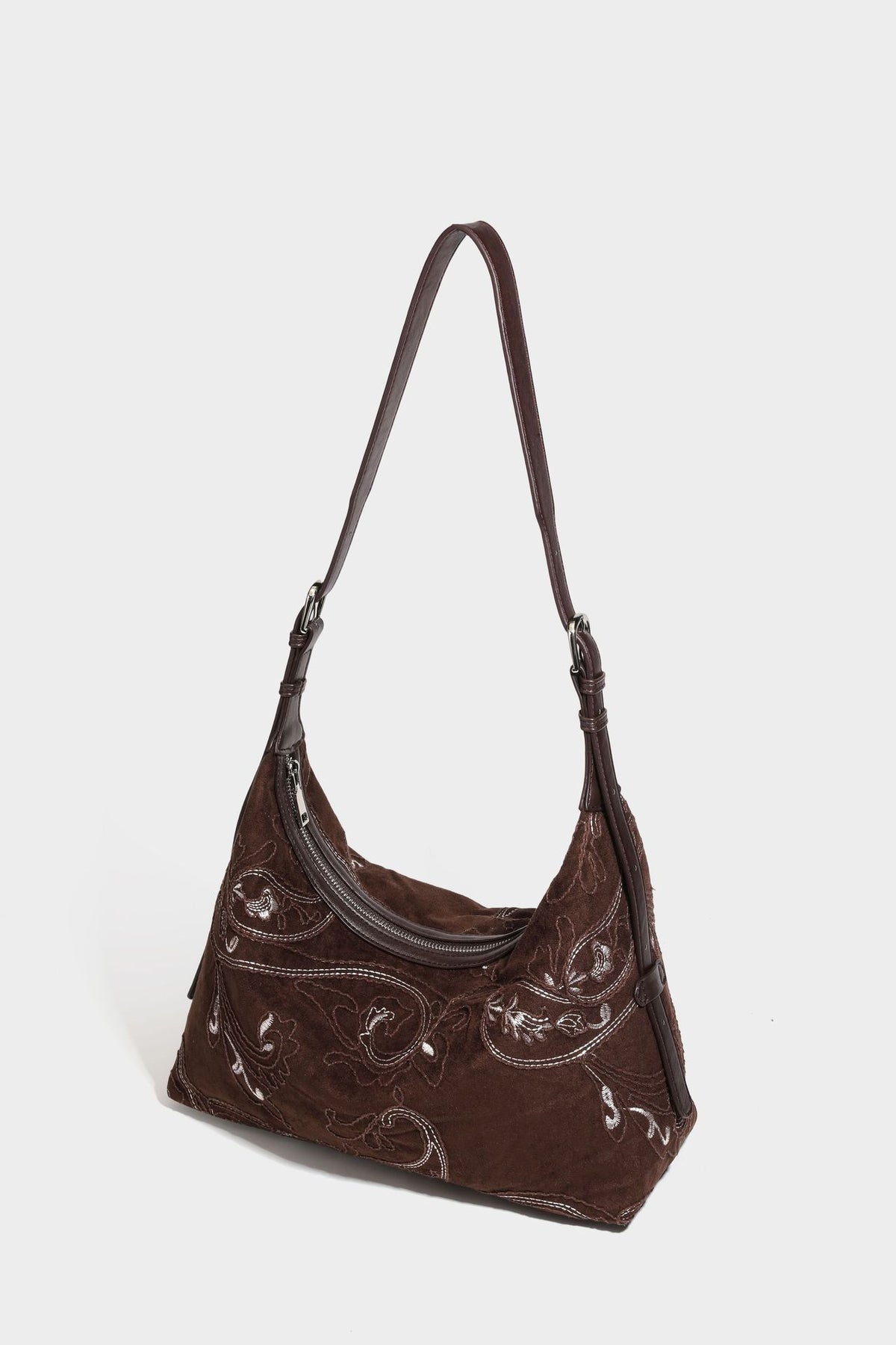 Deep chocolate suede-look hobo shoulder bag with tonal paisley floral embroidery, smooth dark leather-look trim, top zip