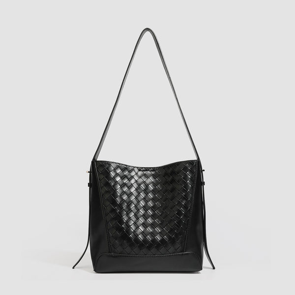 Large black bucket shoulder bag with diamond woven leather-look front panel, smooth side panels, magnetic snap closure, and