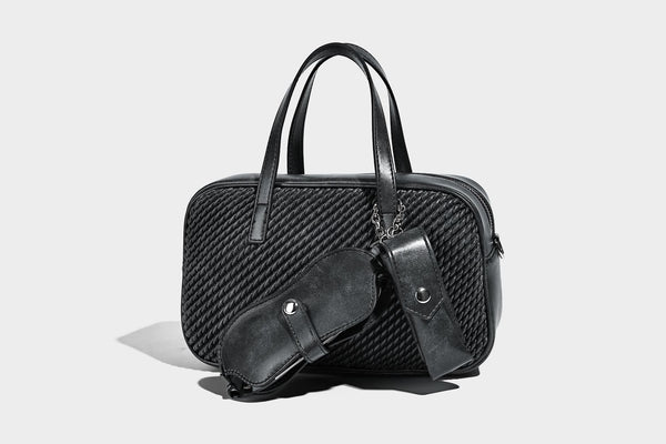 Structured woven-texture front top-handle handbag with zip closure, dual handles, detachable shoulder strap, and matching