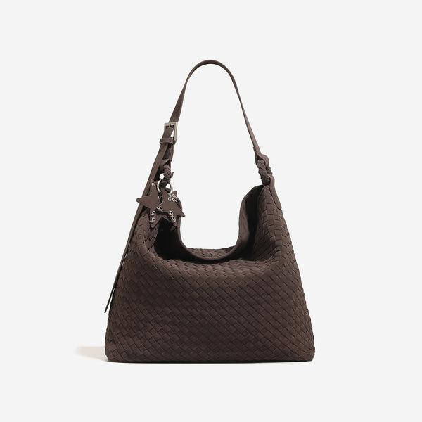 Slouchy woven hobo shoulder bag with matte suede-like finish, adjustable strap, and star charm hardware, detail view 7