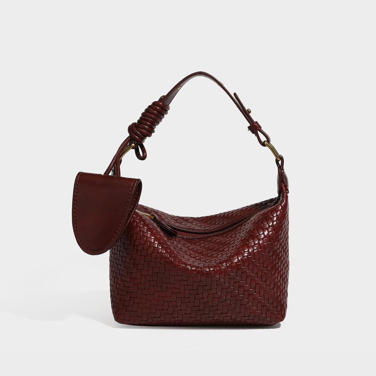 Small glossy basket-weave hobo shoulder bag in brown with knotted top handle, flap accent pocket, and gold-tone hardware