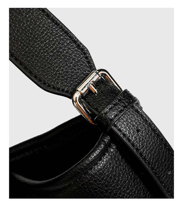 Large black pebbled leather-look hobo shoulder bag with silver-tone turn-lock front hardware and single flat adjustable
