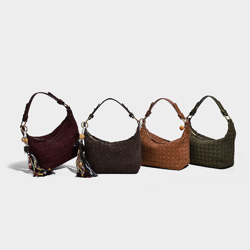Small woven-texture crescent hobo bag in dark chocolate brown with top zip closure, gold-tone hardware, and adjustable