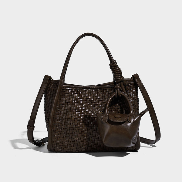 Woven texture open-top tote bag with smooth trim top handles and attached mini drawstring pouch in dark brown, detail view 6