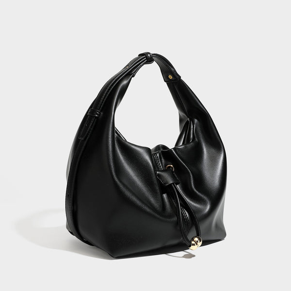 Slouchy hobo bag with smooth leather-look finish, drawstring cinch closure, and gold-tone bead hardware, detail view 6