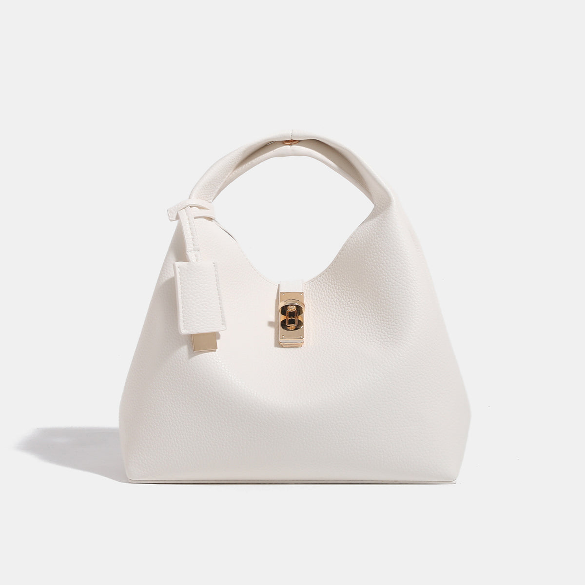 Structured pebbled leather-look bucket tote with gold-tone turn-lock hardware and looped top handle, detail view 6