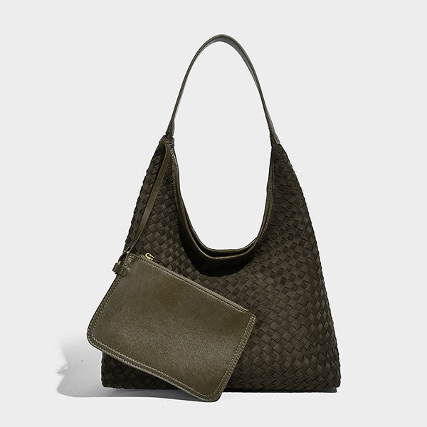 Large slouchy woven hobo tote bag with curved shoulder strap and triangular silhouette, detail view 7