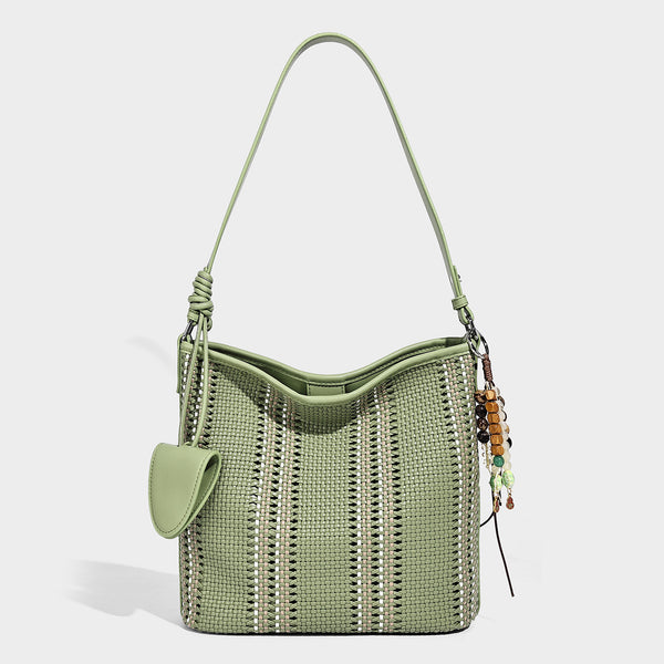 Woven bucket shoulder bag with leather-look trim, silver-tone hardware, and beaded tassel charm, detail view 13