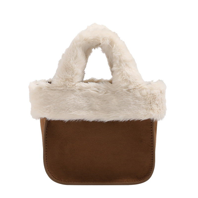 Mini structured handbag with cream faux-fur trim and suede-look textured body, shown with top handles and removable