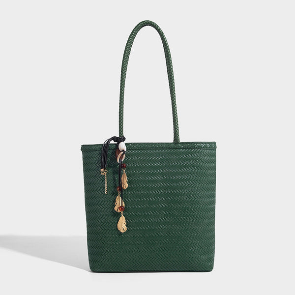 Structured woven herringbone tote bag with braided double shoulder handles in tan brown, shown with matching drawstring