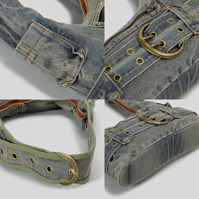Washed blue-gray denim slouchy hobo shoulder bag with wide grommeted belt panel, brass-tone D-ring buckle, exterior zip