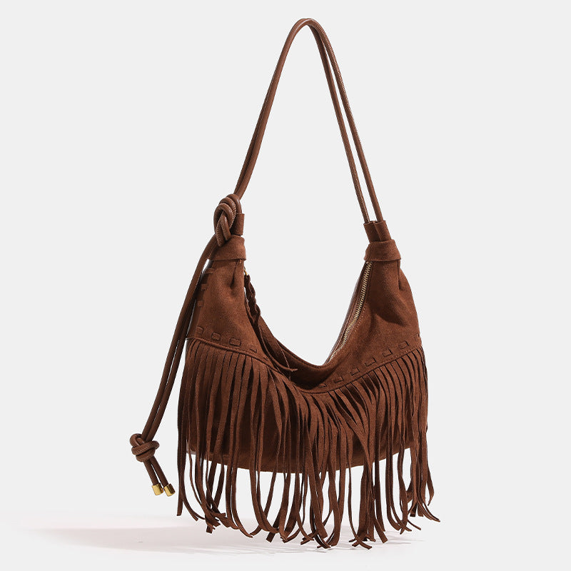Slouchy fringe hobo shoulder bag in matte suede-like finish with tie-knot cord strap and gold-tone zip closure, detail view 2
