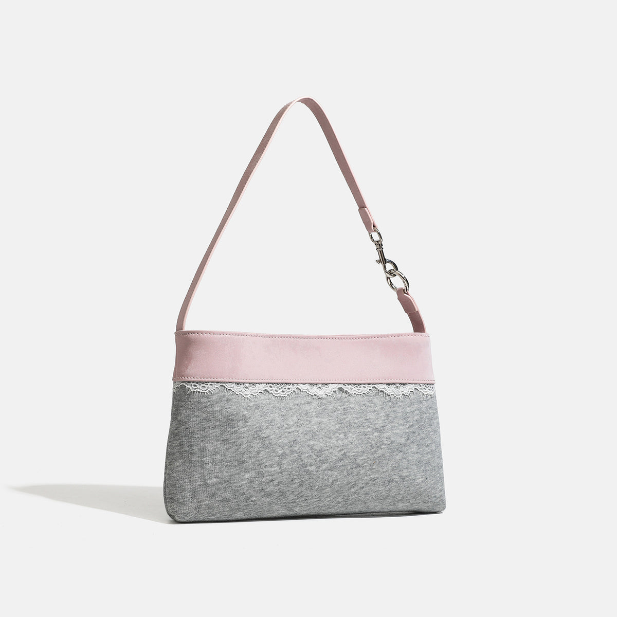 Compact gray textile shoulder bag with lace trim and smooth leather-look strap, detail view 2