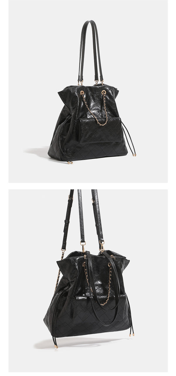Quilted crinkled leather-look convertible tote backpack with gold-tone chain handles and drawstring closure, detail view 10